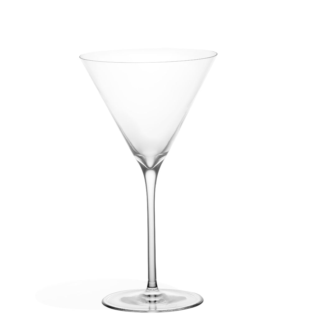 A clear glass martini stemware with a classic conical shape and a stem, displayed against a white background.