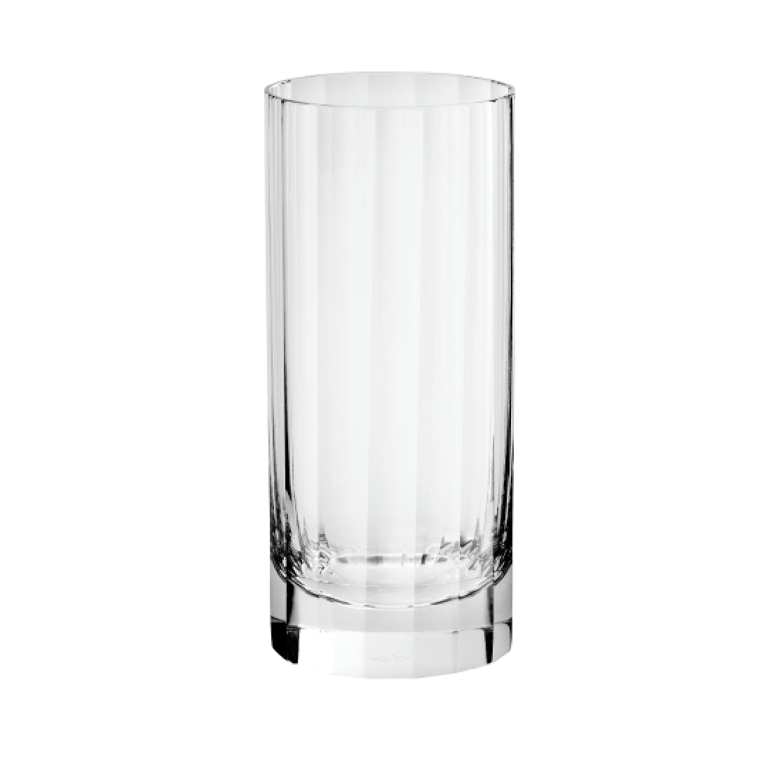 A clear fluted highball glass on a white background.