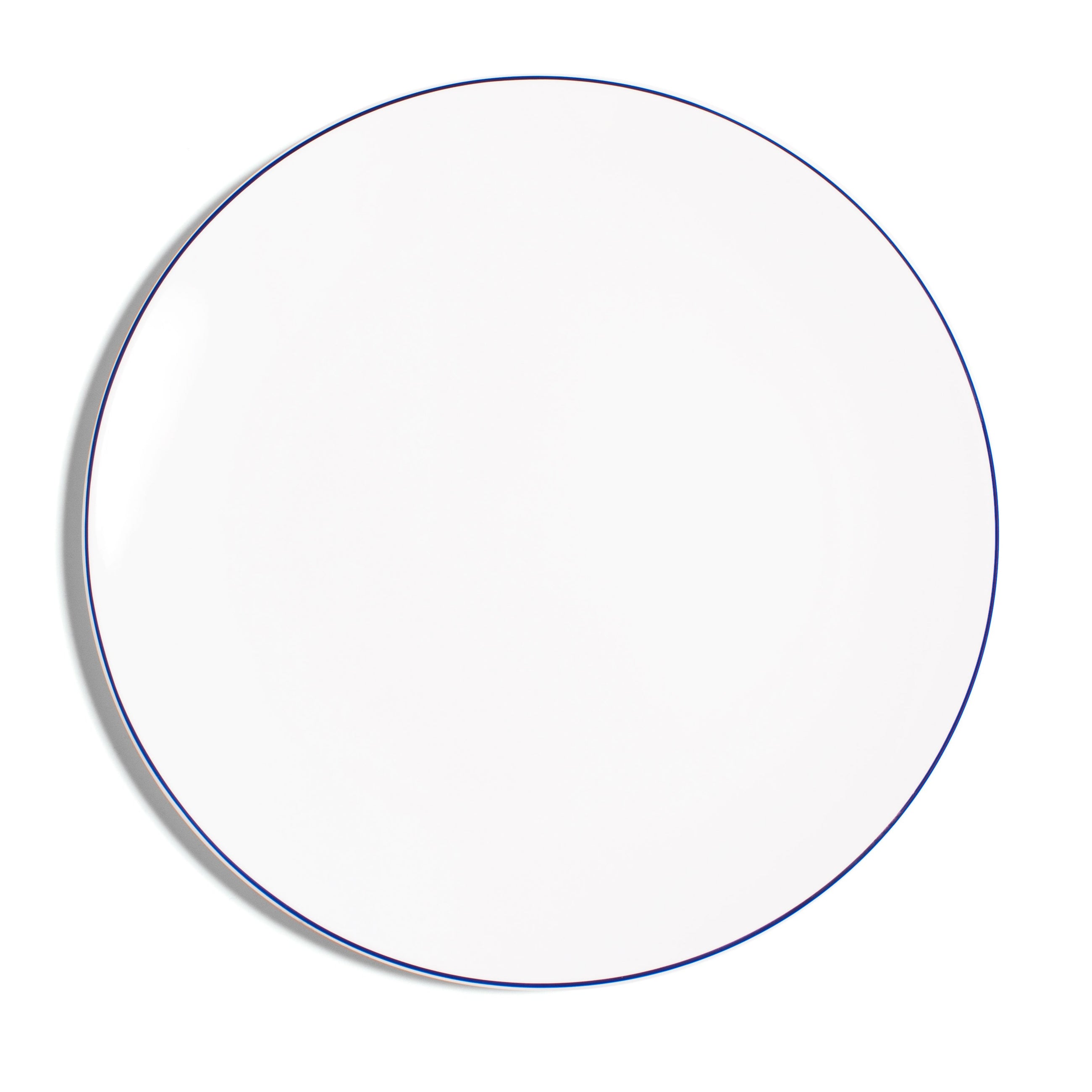 Clear circular plate with a blue outline on a white background