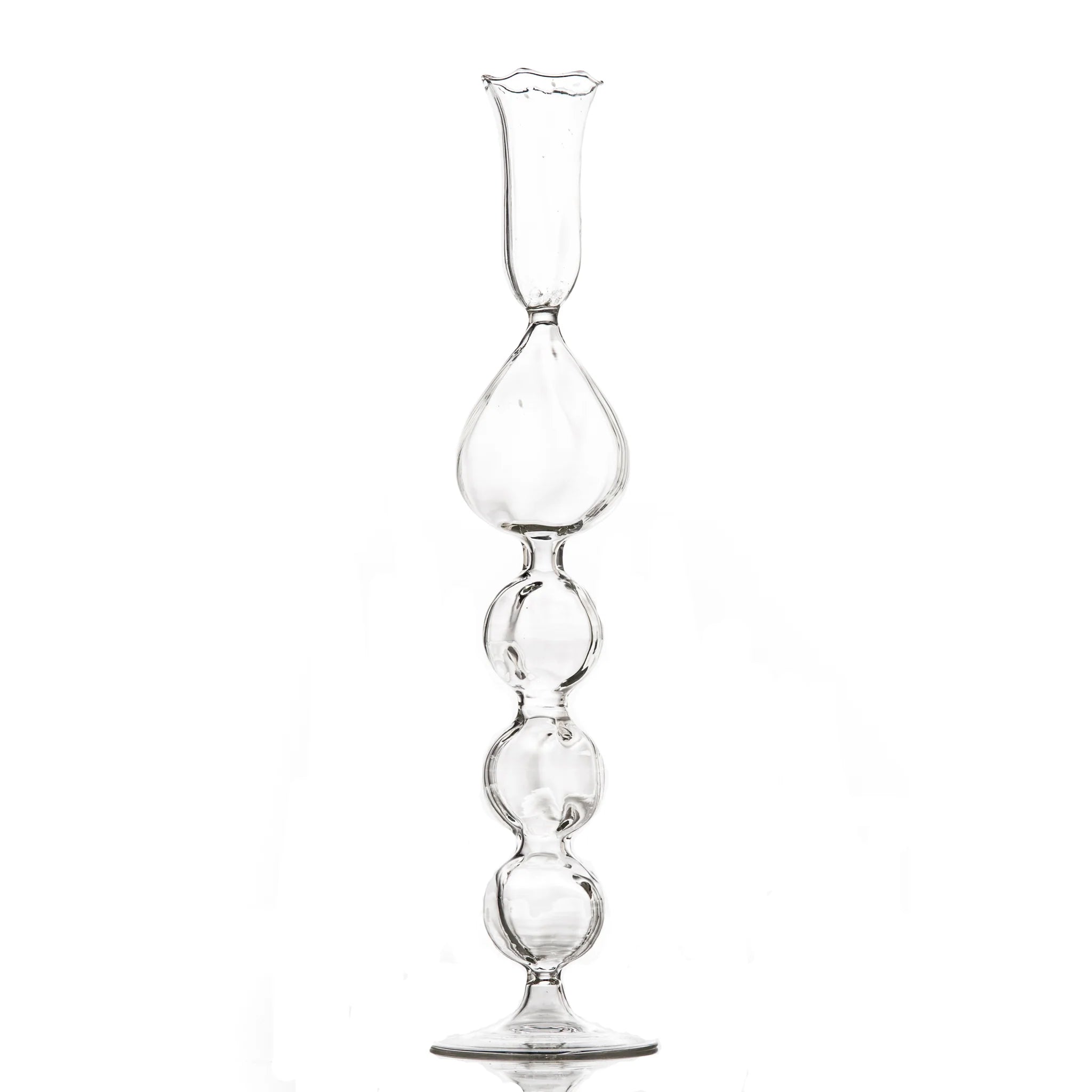 Clear glass hourglass on a white background