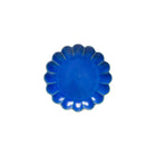 Blue ceramic plate with a decorative edge on a white background