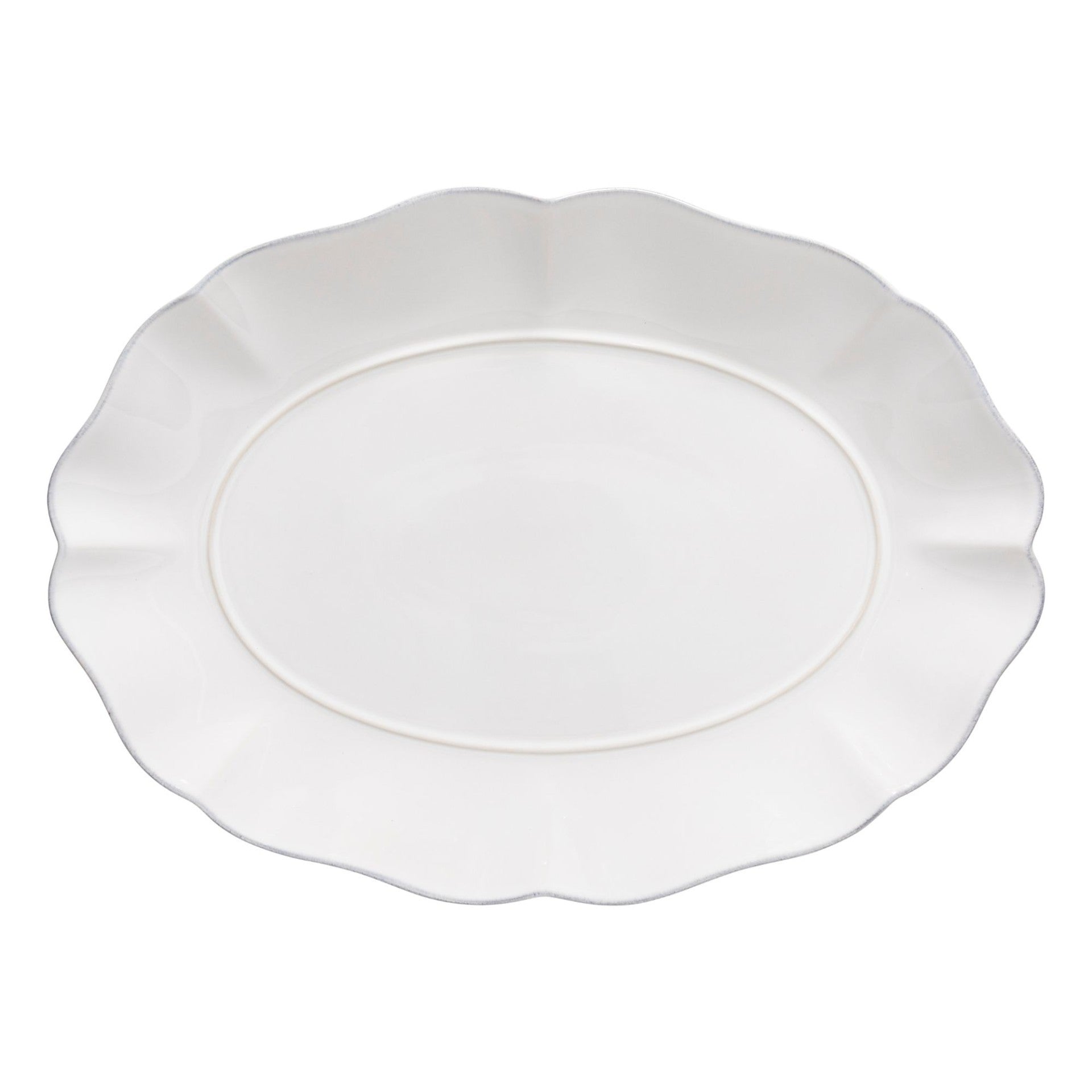 White scalloped-edge platter on a white background