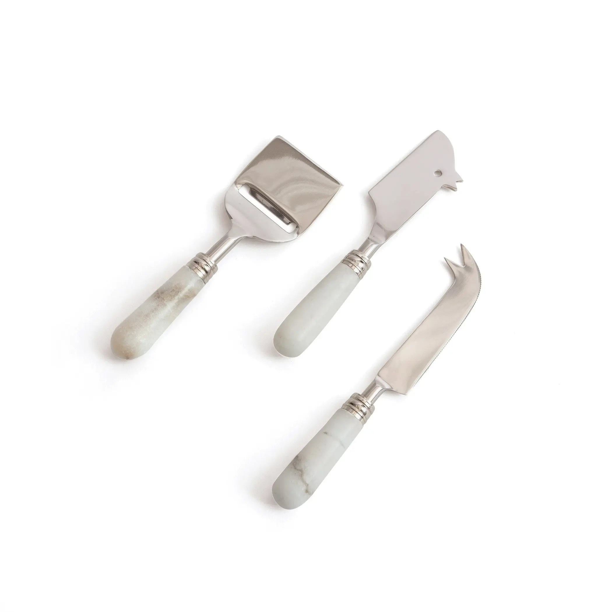 Set of three cheese tools with marble handles on a white background