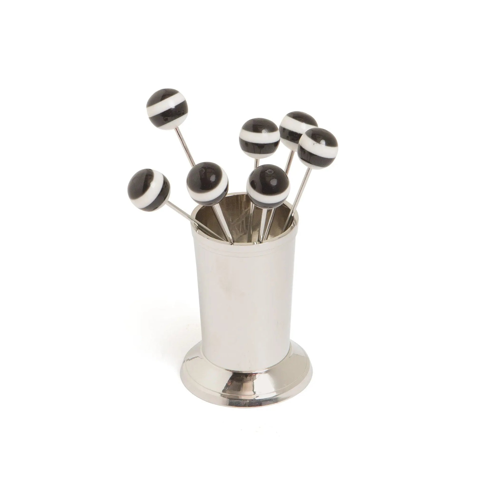 Silver holder with black and white striped sticks on a white background