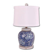 Table lamp with blue floral design on a white background