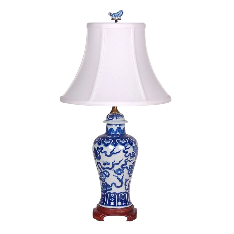 Decorative lamp with blue and white design on a white background