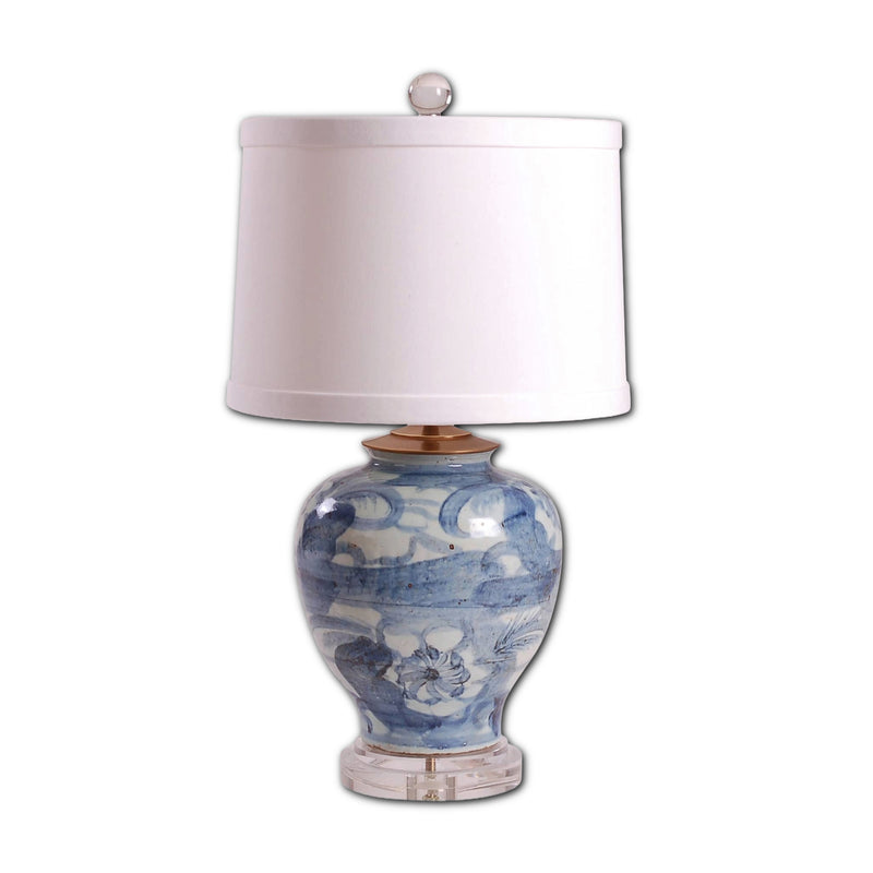 Decorative lamp with blue floral patterns on a white background