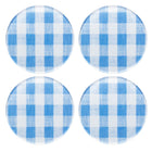 Four blue and white checkered circular coasters on a white background