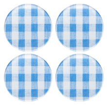 Four blue and white checkered circular coasters on a white background