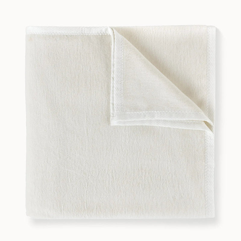 White textured blanket on a white background