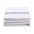 Folded gray bed sheet with blue stripes on a white background
