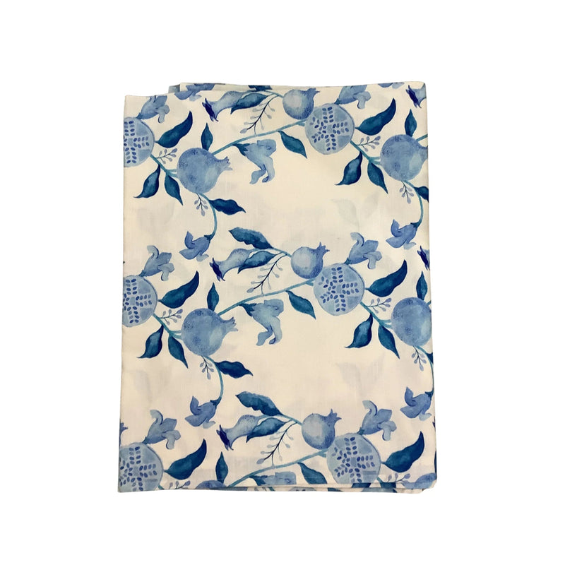 Fleece blanket with blue floral pattern on a white background
