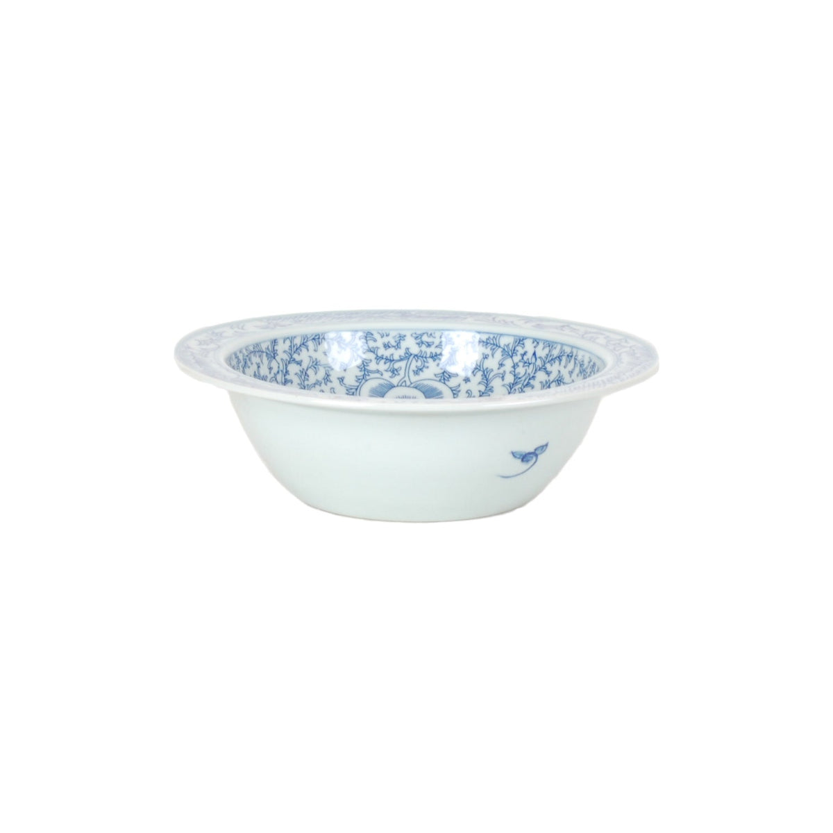 White ceramic bowl with blue floral patterns on a white background