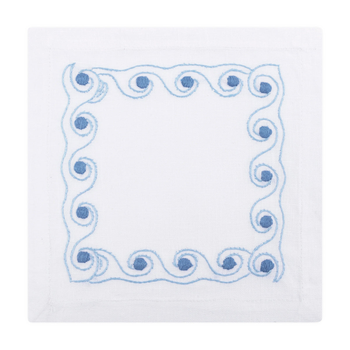 White napkin with blue decorative border on a white background