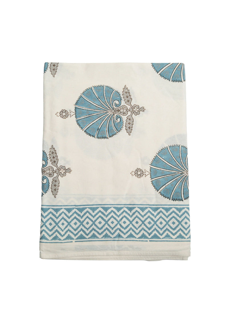 Decorative towel with blue and beige patterns on a white background