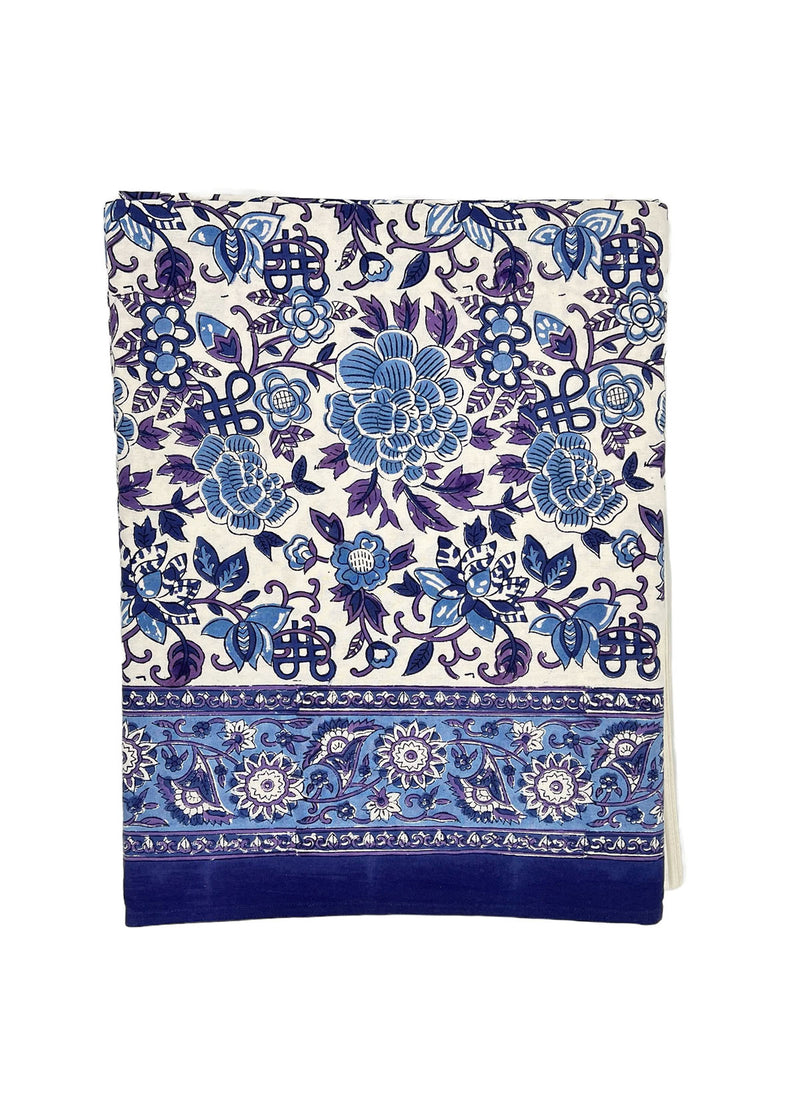 Notebook with blue floral pattern on a white background