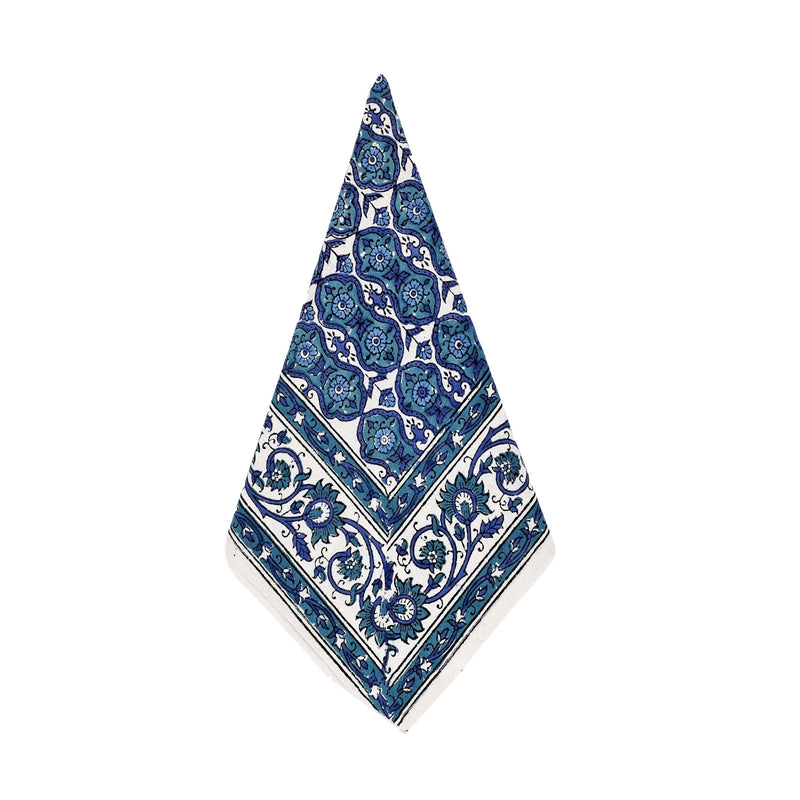 Decorative towel with blue floral pattern on a white background