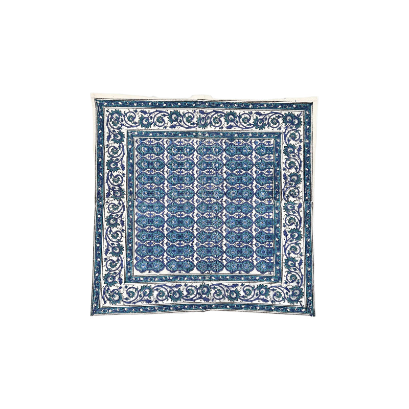 Blue and white patterned napkin on a white background