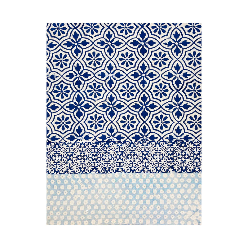 Napkin with blue and white geometric pattern on a white background