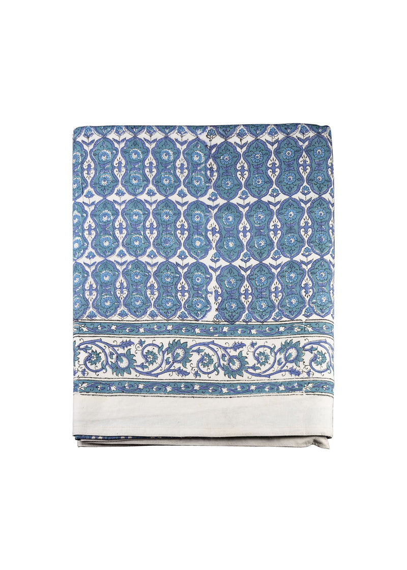 Blue and white patterned fabric on a white background