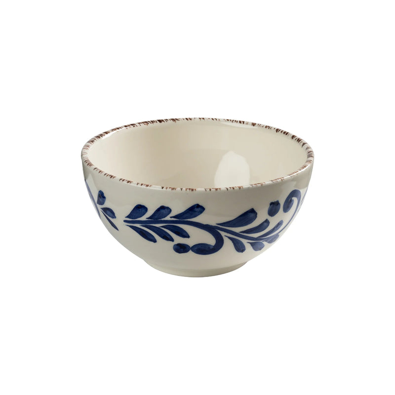 Ceramic bowl with blue floral patterns on a white background