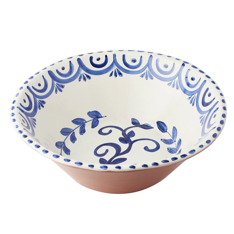 Ceramic bowl with blue decorative patterns on a white background