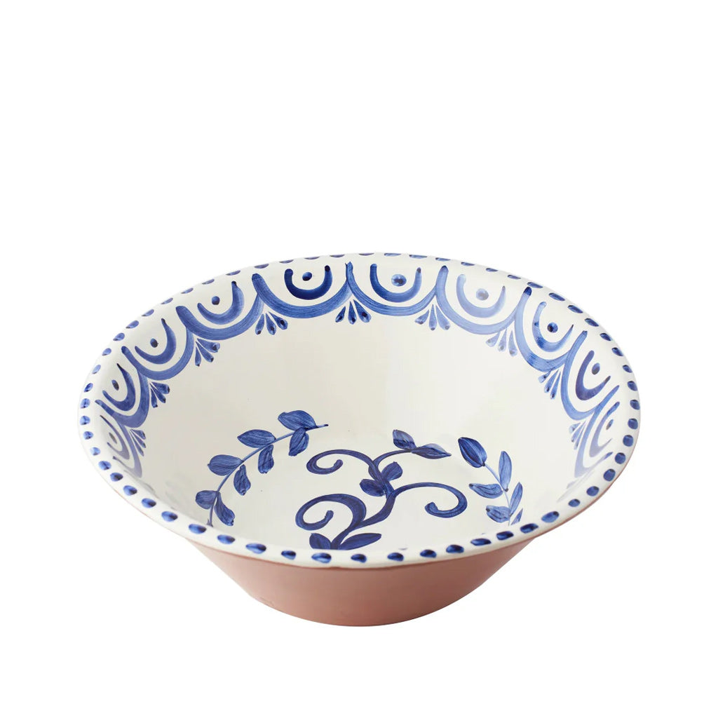 Ceramic bowl with blue decorative patterns on a white background