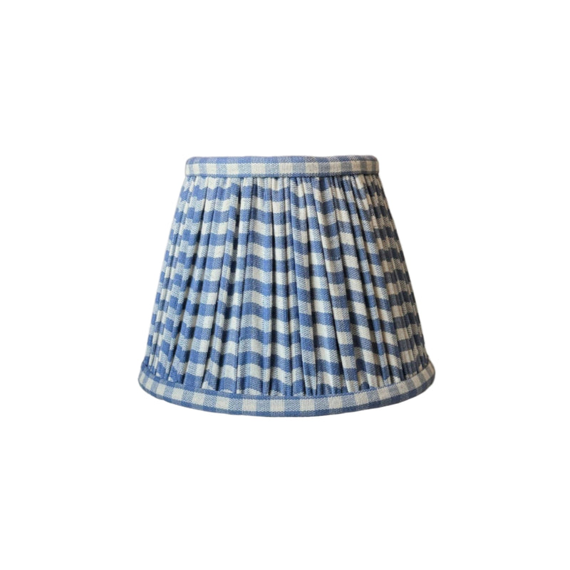 Blue and white checkered lampshade on a white background