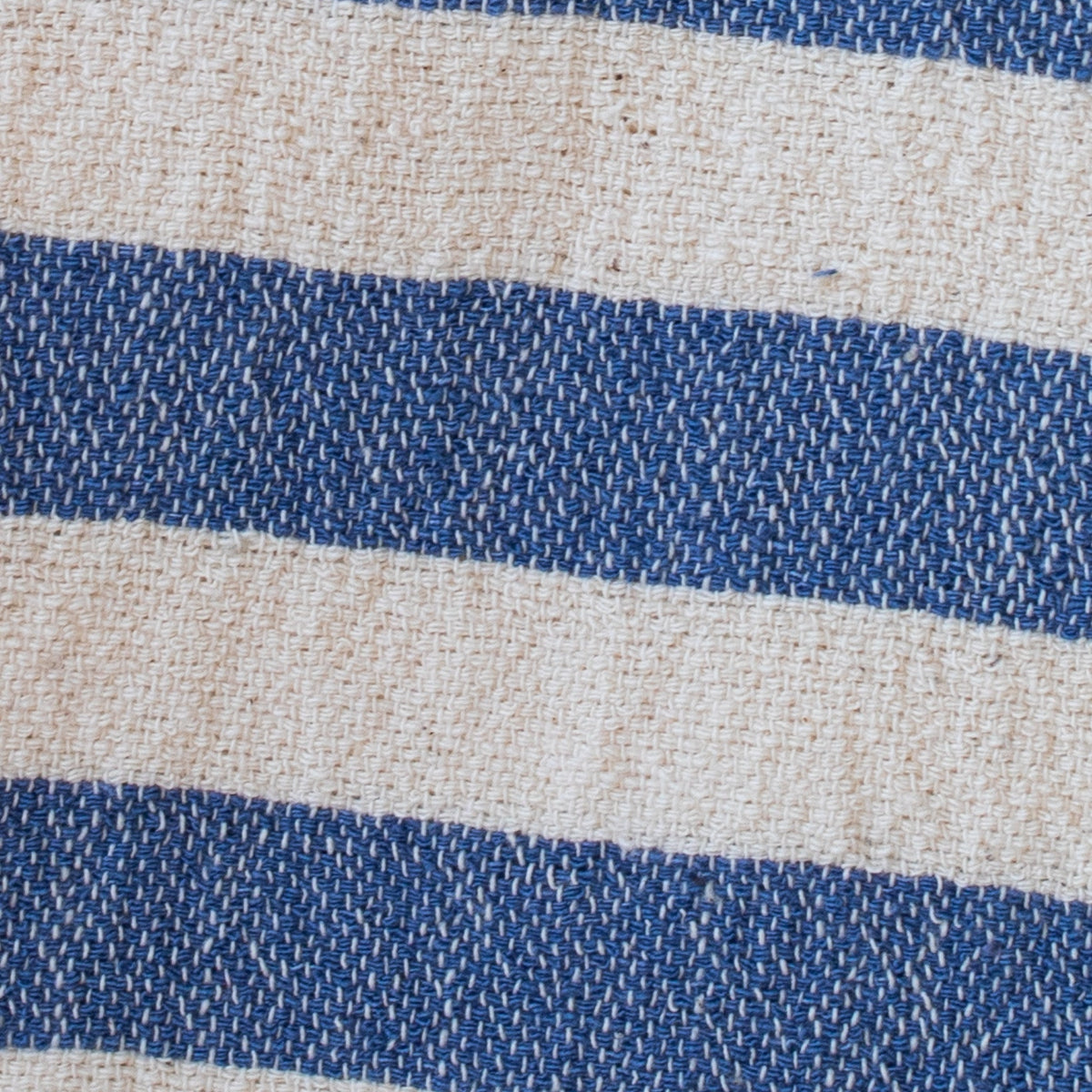Close-up of blue and beige striped fabric texture