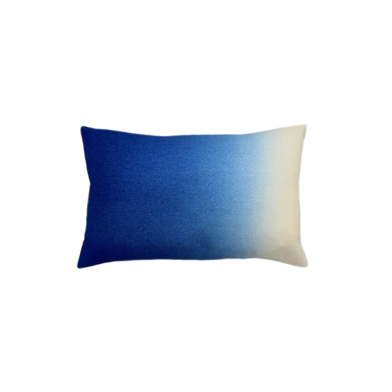 Blue and white gradient pillow on a white background