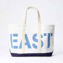 White tote bag with blue 'EAST' text on a white background