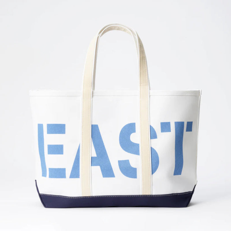 White tote bag with blue 'EAST' text on a white background