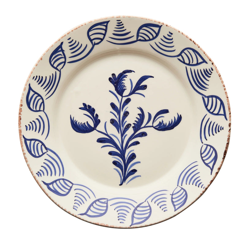 Ceramic plate with blue floral design on a white background