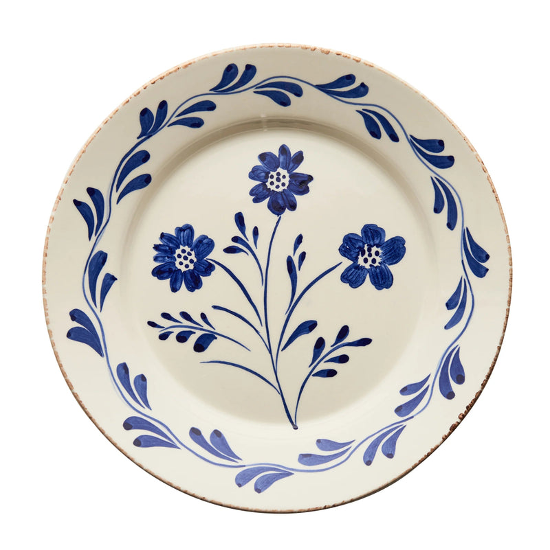 Ceramic plate with blue floral design on a white background
