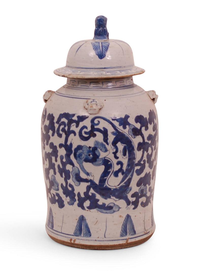 Ceramic jar with blue floral patterns on a white background