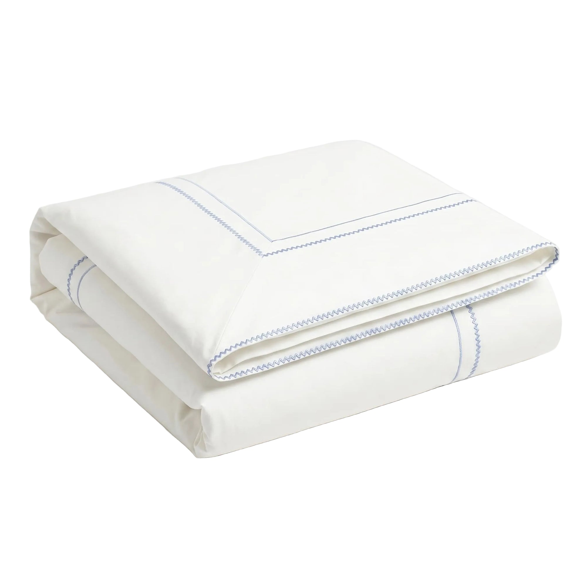 Folded white towel with blue hem on a light gray background