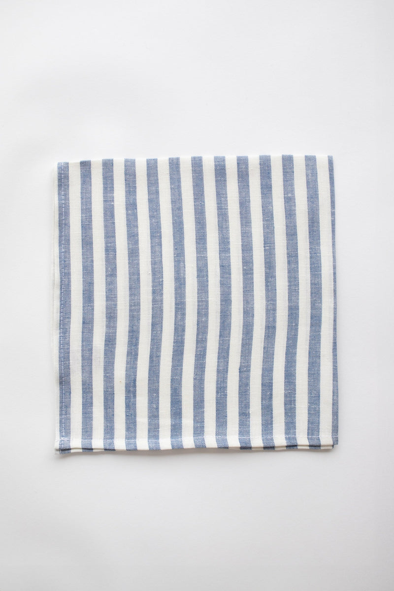 Blue and white linen napkin on white background