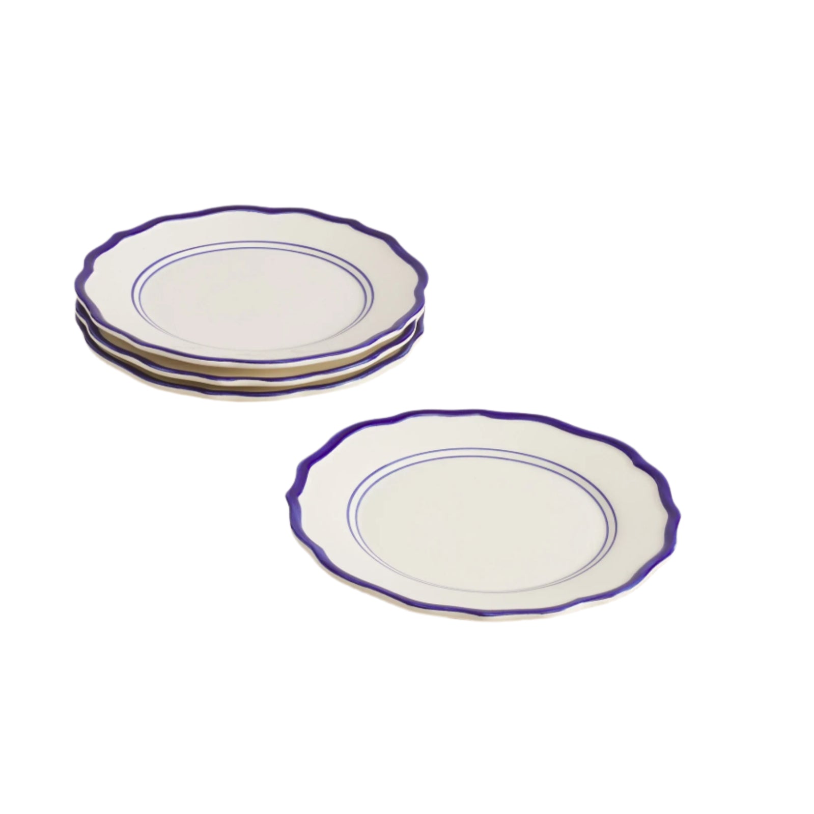 Set of 4 ceramic plates with blue rims on a neutral background