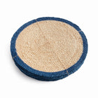 Round woven mat with blue border on a white background