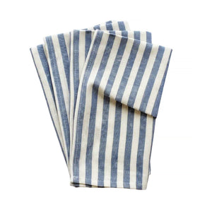 Set of blue and white striped napkins on a white background