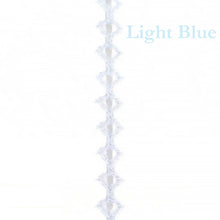 Light blue decorative string on a white background