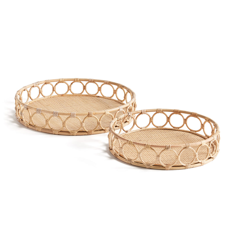 Two circular woven trays with circles around edge on white background