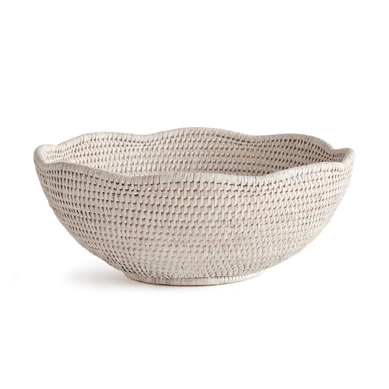 Woven off-white bowl with scalloped edge on white background
