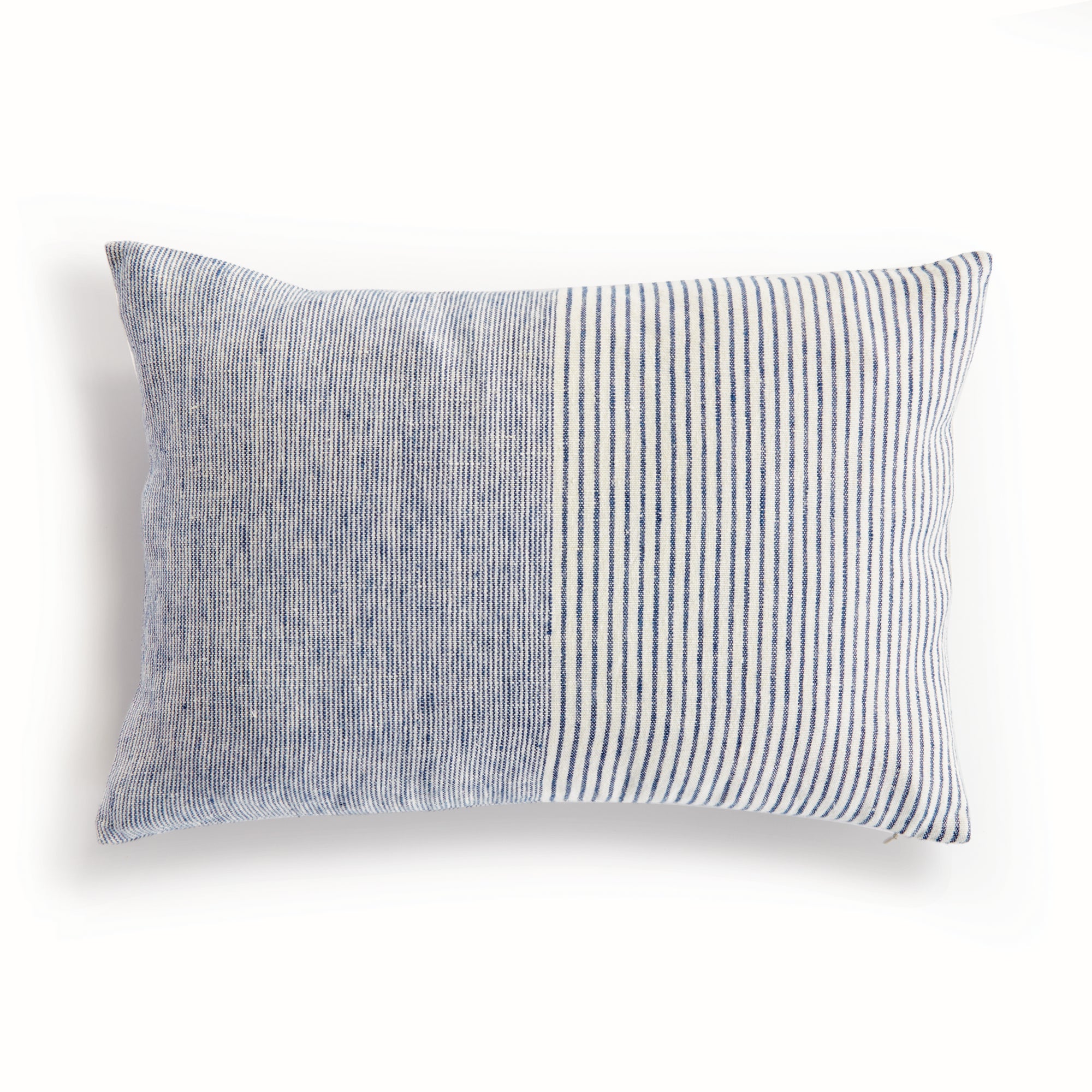 Rectangular pillow with thin blue stripes on white background