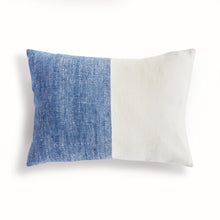 Half blue and half white rectangular pillow on white background