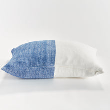 Half blue and half white rectangular pillow on white background