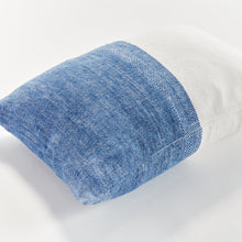 Half blue and half white rectangular pillow on white background