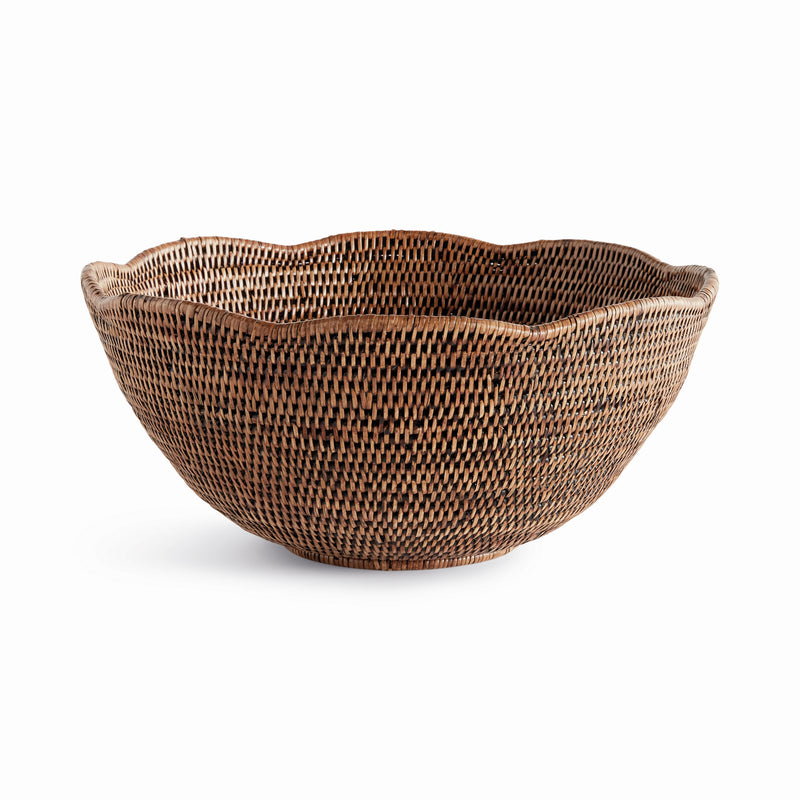 Brown rattan scalloped bowl on white background