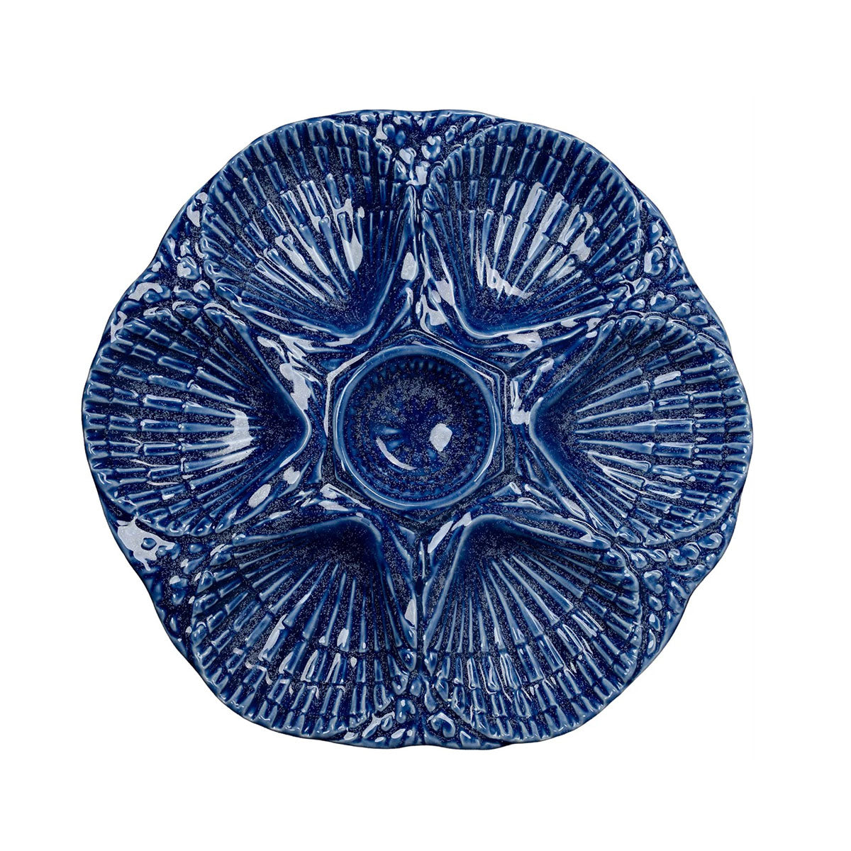 Blue ceramic plate with textured design on a white background
