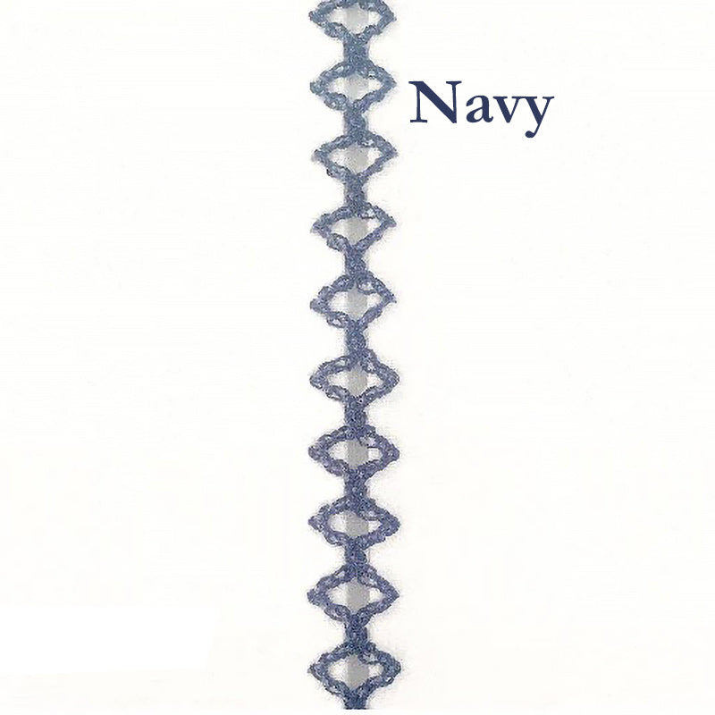 Navy blue decorative trim with a geometric pattern on a white background